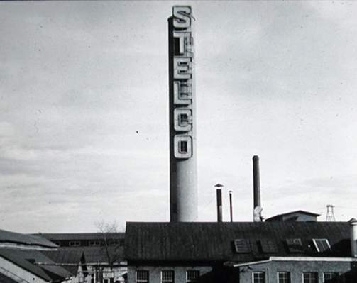 Our History - A picture of a smoke stack from the Notre Dame works from the 1930s